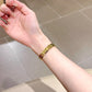 LuxeCross™ Bangle-Style Apple Watch Band – Polished Metallic Finish